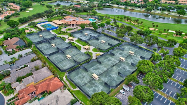 birds eye view of property featuring a water view