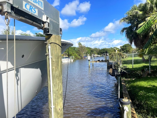 view of dock with a water view