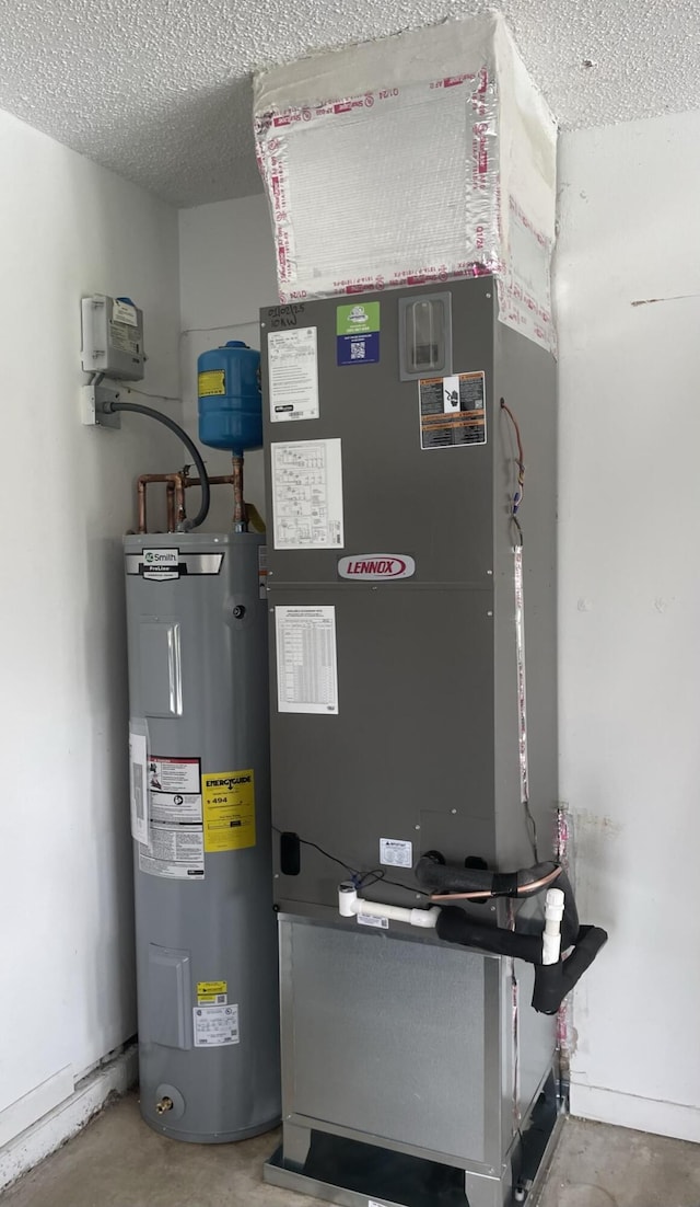 utilities featuring electric water heater and heating unit