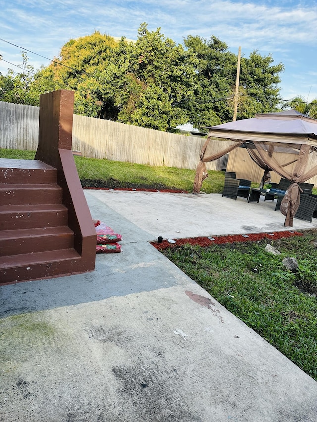 view of yard with a gazebo and a patio area