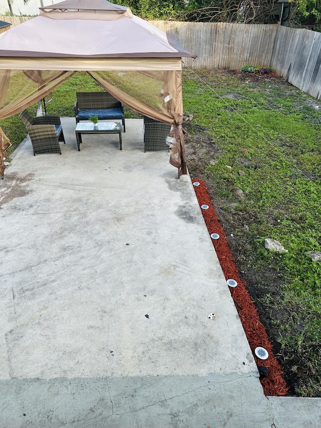 view of yard with a gazebo and a patio area