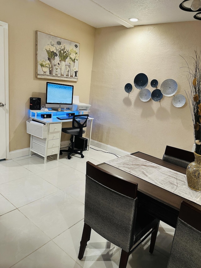 office area with light tile patterned floors