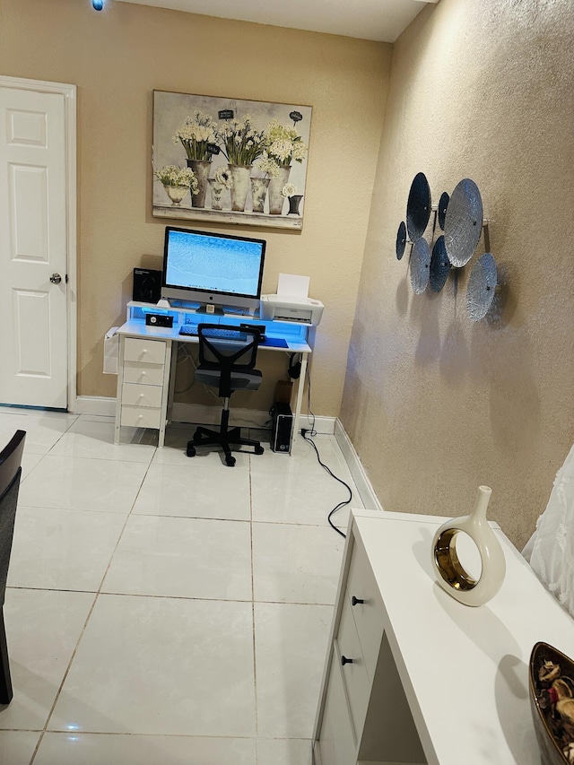 office space with light tile patterned floors