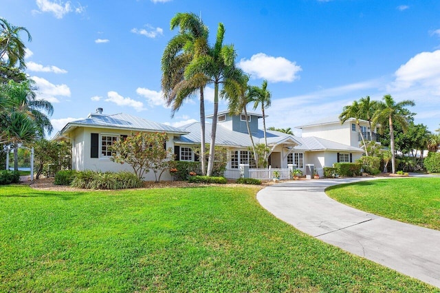 ranch-style home with a front yard