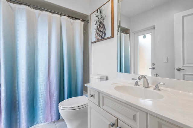 bathroom with toilet, tile patterned flooring, a shower with curtain, and vanity