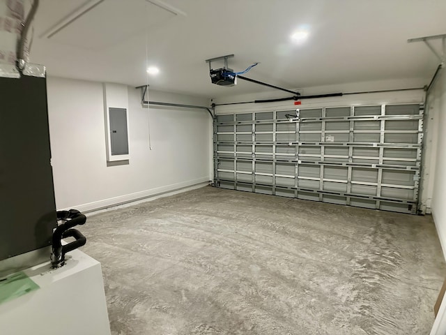 garage with electric panel and a garage door opener