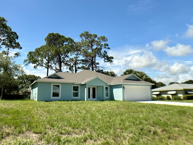 ranch-style home with french doors, a garage, and a front lawn