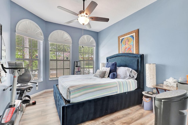 bedroom featuring ceiling fan and light hardwood / wood-style floors