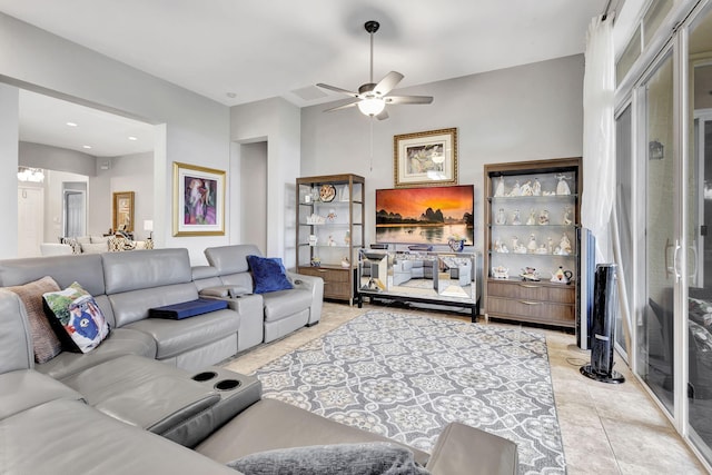 living room featuring ceiling fan and light tile patterned floors