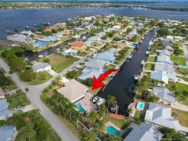 drone / aerial view featuring a water view