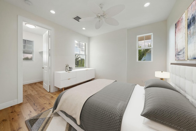 bedroom featuring ceiling fan and light hardwood / wood-style floors