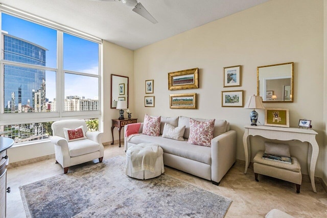 living area featuring ceiling fan