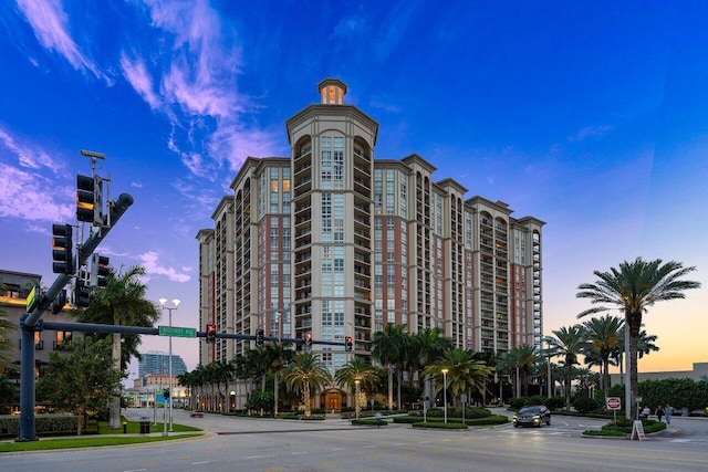 view of outdoor building at dusk