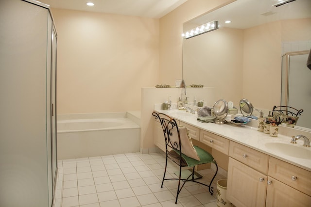 bathroom featuring tile patterned floors, vanity, and independent shower and bath