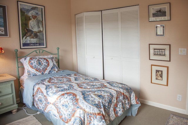 carpeted bedroom with a closet