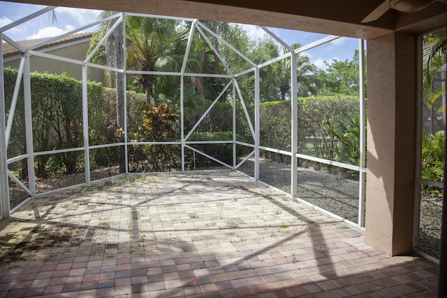 view of patio with a lanai