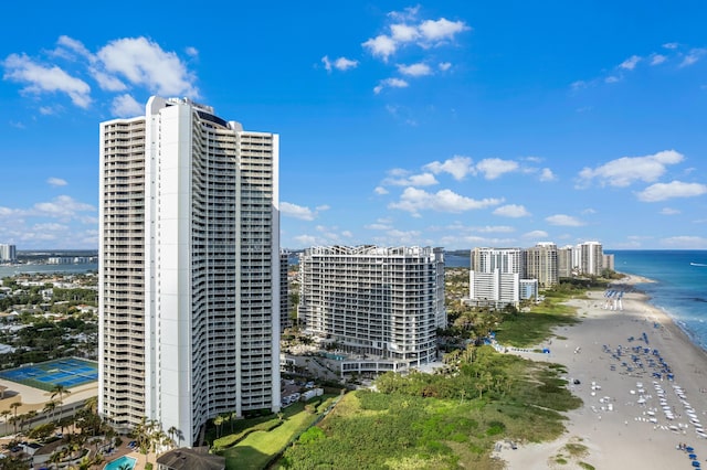 exterior space featuring a view of the beach and a water view