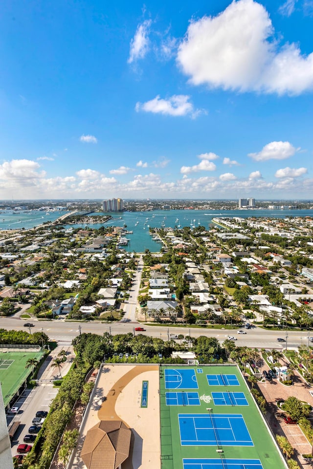 birds eye view of property featuring a water view