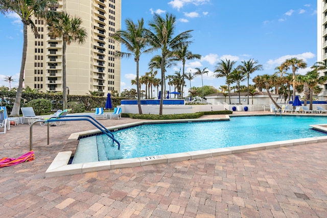 view of swimming pool featuring a patio