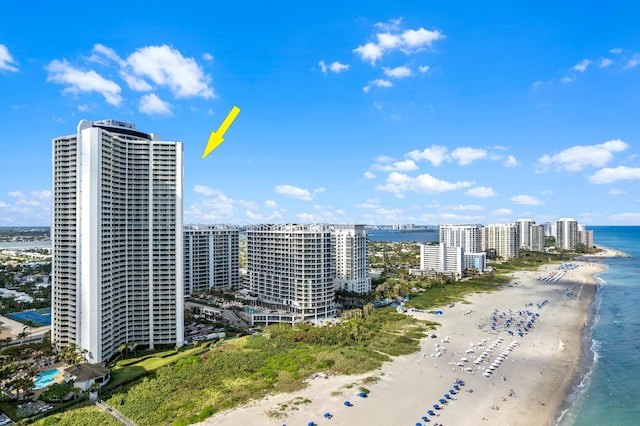 bird's eye view with a view of the beach and a water view