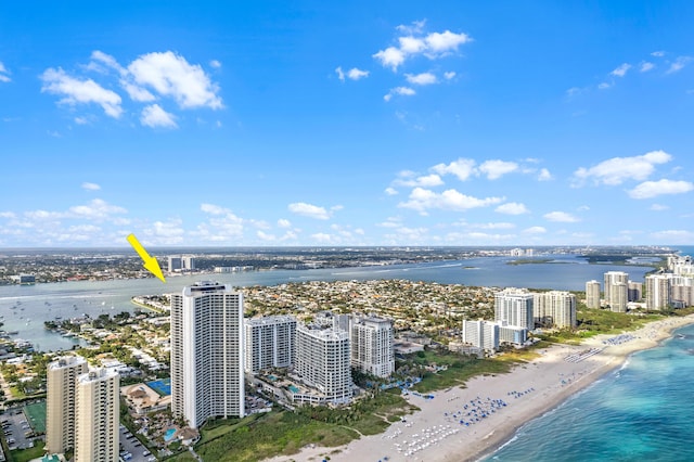 aerial view featuring a water view and a view of the beach