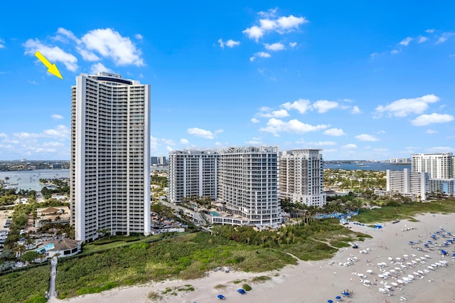 aerial view with a view of the beach and a water view