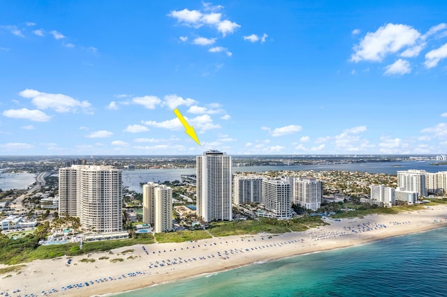 drone / aerial view with a view of the beach and a water view