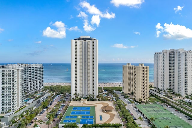 aerial view featuring a water view and a beach view