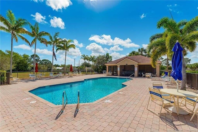 view of swimming pool featuring a patio