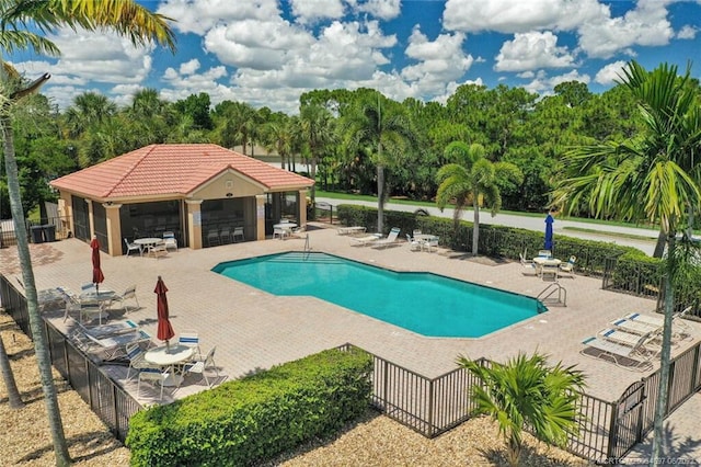 view of swimming pool featuring a patio area