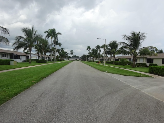 2864 Crosley Dr E Unit A, West Palm Beach, FL 33415 - view of road with street lighting and a residential view
