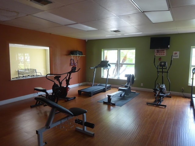 2864 Crosley Dr E Unit A, West Palm Beach, FL 33415 - workout area with visible vents, a paneled ceiling, and wood finished floors