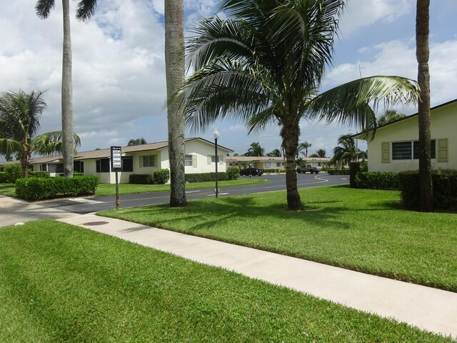 2864 Crosley Dr E Unit A, West Palm Beach, FL 33415 - surrounding community featuring a yard