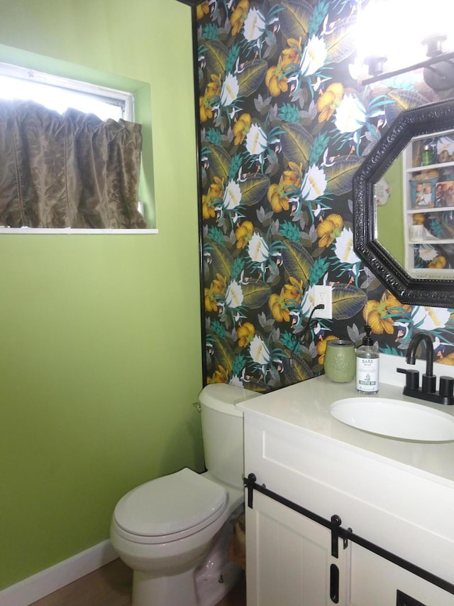 2864 Crosley Dr E Unit A, West Palm Beach, FL 33415 - half bath with vanity, baseboards, and toilet