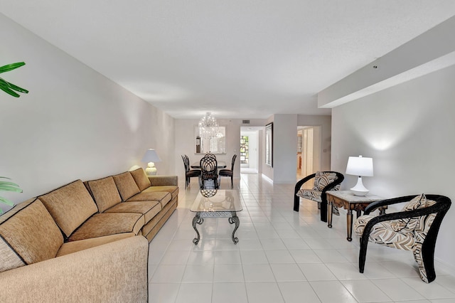 tiled living room featuring a notable chandelier