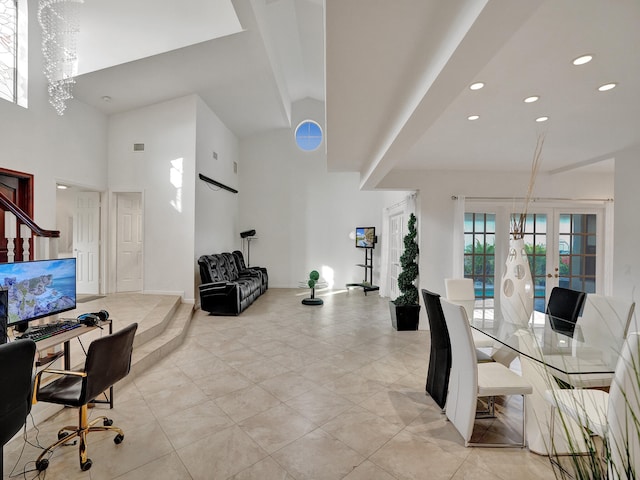 tiled dining space featuring french doors