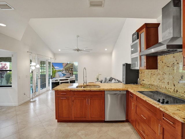 kitchen featuring ceiling fan, dishwasher, wall chimney exhaust hood, kitchen peninsula, and black electric stovetop