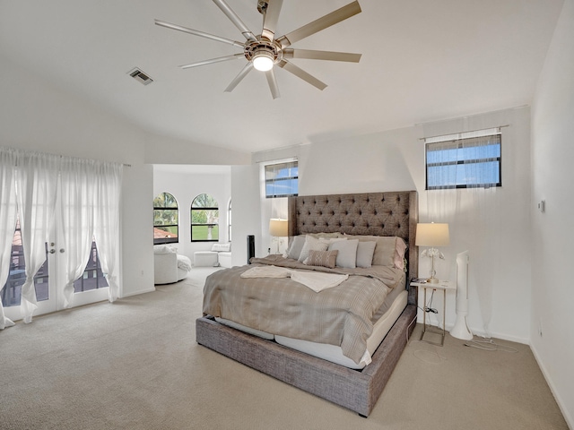 bedroom with lofted ceiling, access to outside, french doors, ceiling fan, and light colored carpet