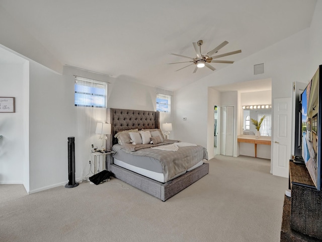 bedroom with carpet, ceiling fan, and vaulted ceiling