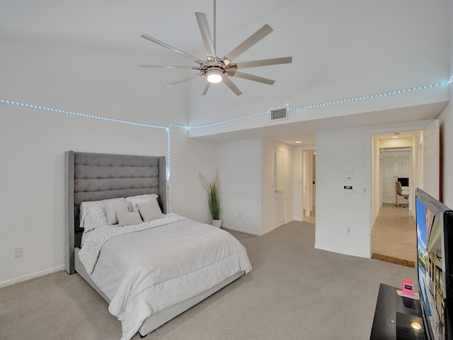 bedroom with ceiling fan and carpet