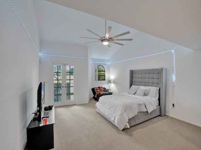 carpeted bedroom featuring french doors, access to outside, high vaulted ceiling, and ceiling fan