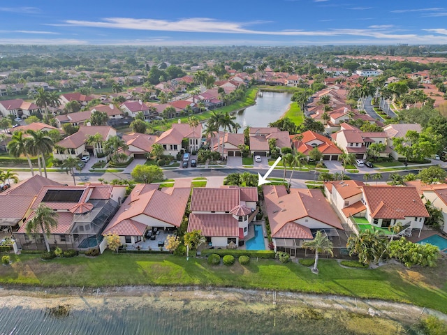 drone / aerial view featuring a water view