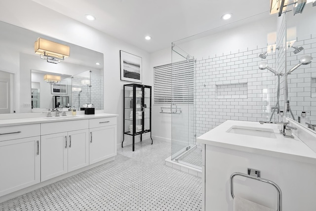 bathroom featuring vanity and walk in shower