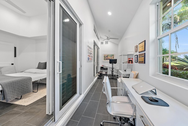 interior space with high vaulted ceiling and ceiling fan