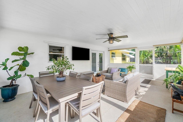 sunroom / solarium with ceiling fan and wood ceiling