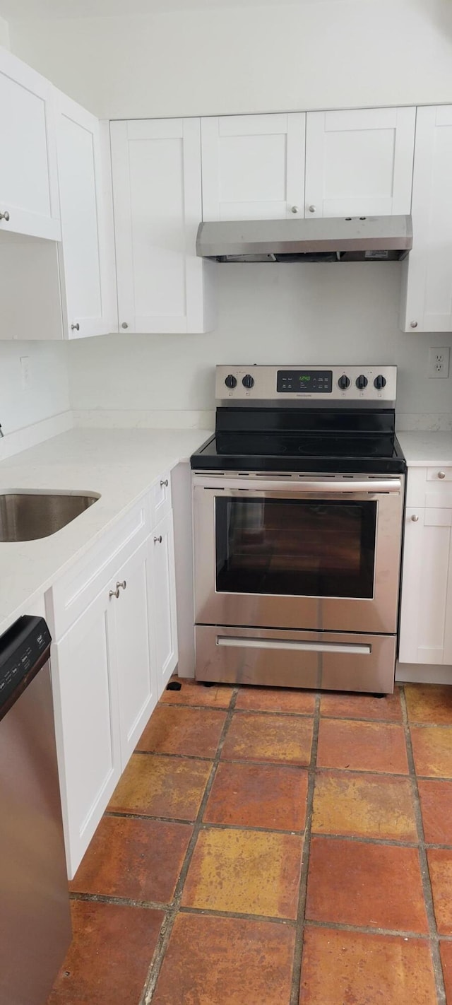 kitchen with white cabinetry, sink, and appliances with stainless steel finishes