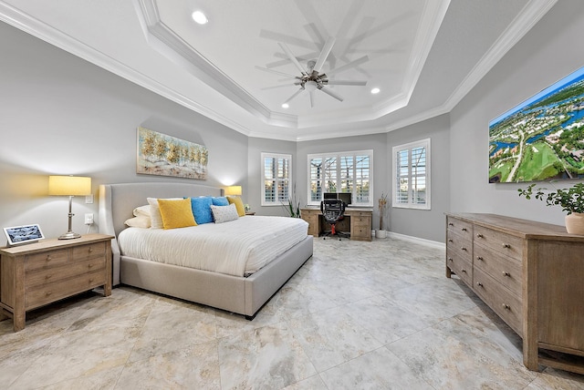 bedroom with ceiling fan, ornamental molding, and a tray ceiling