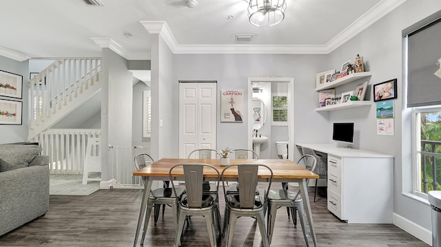 dining room featuring dark hardwood / wood-style floors and ornamental molding