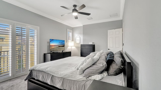 bedroom featuring multiple windows, ceiling fan, light colored carpet, and ornamental molding