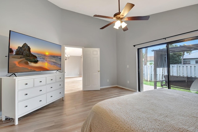 bedroom featuring access to outside, ceiling fan, high vaulted ceiling, and light hardwood / wood-style flooring